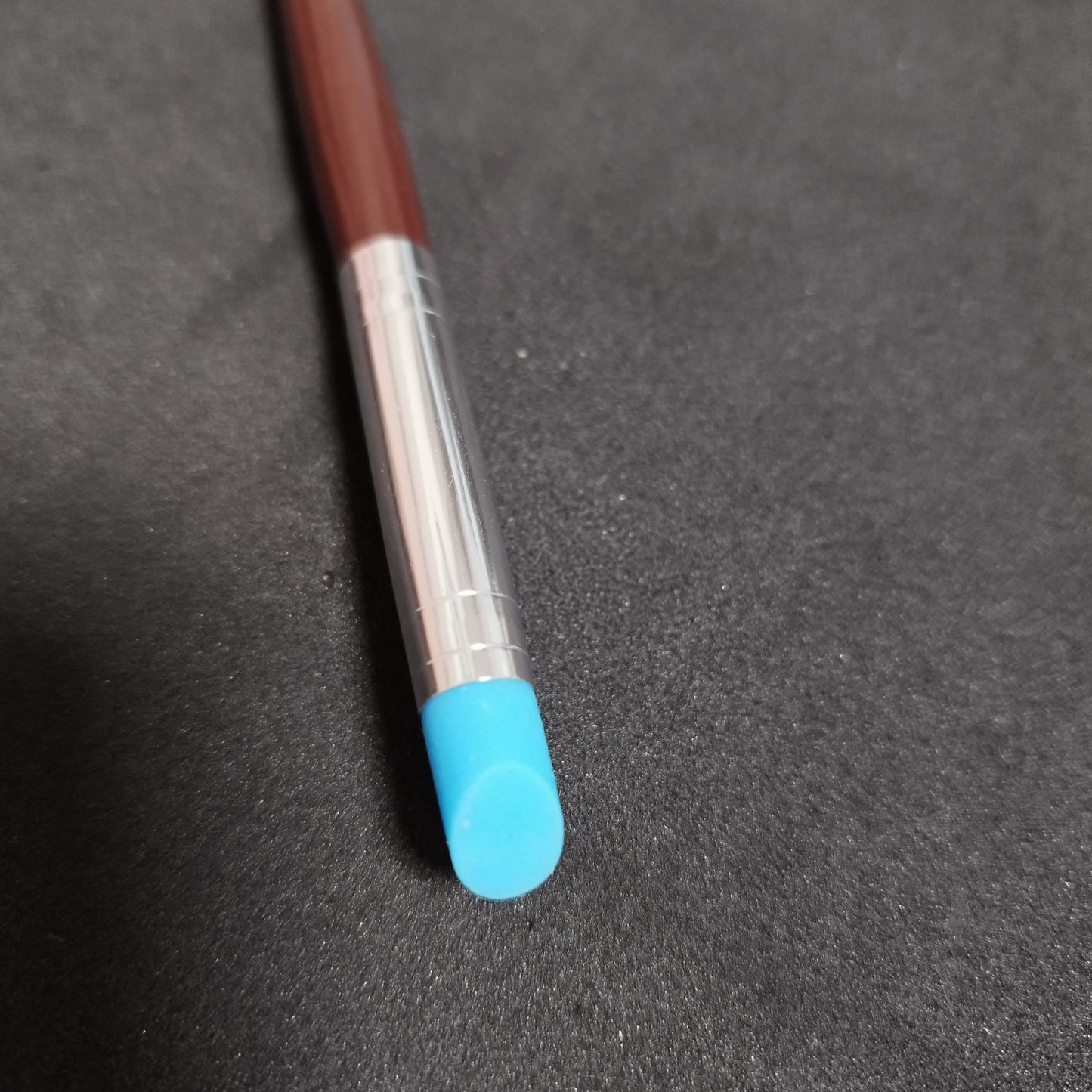 Pincel goma apertura ojos