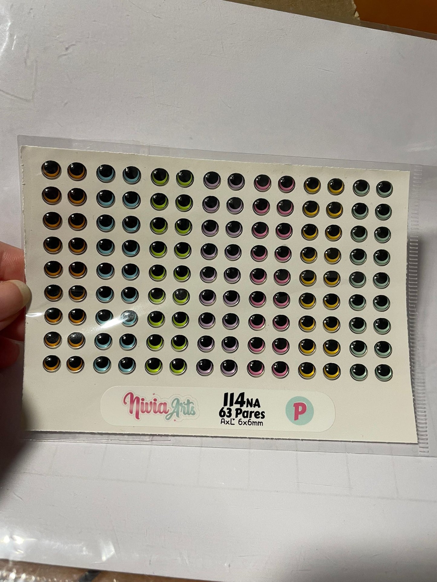 Ojitos resinados 114