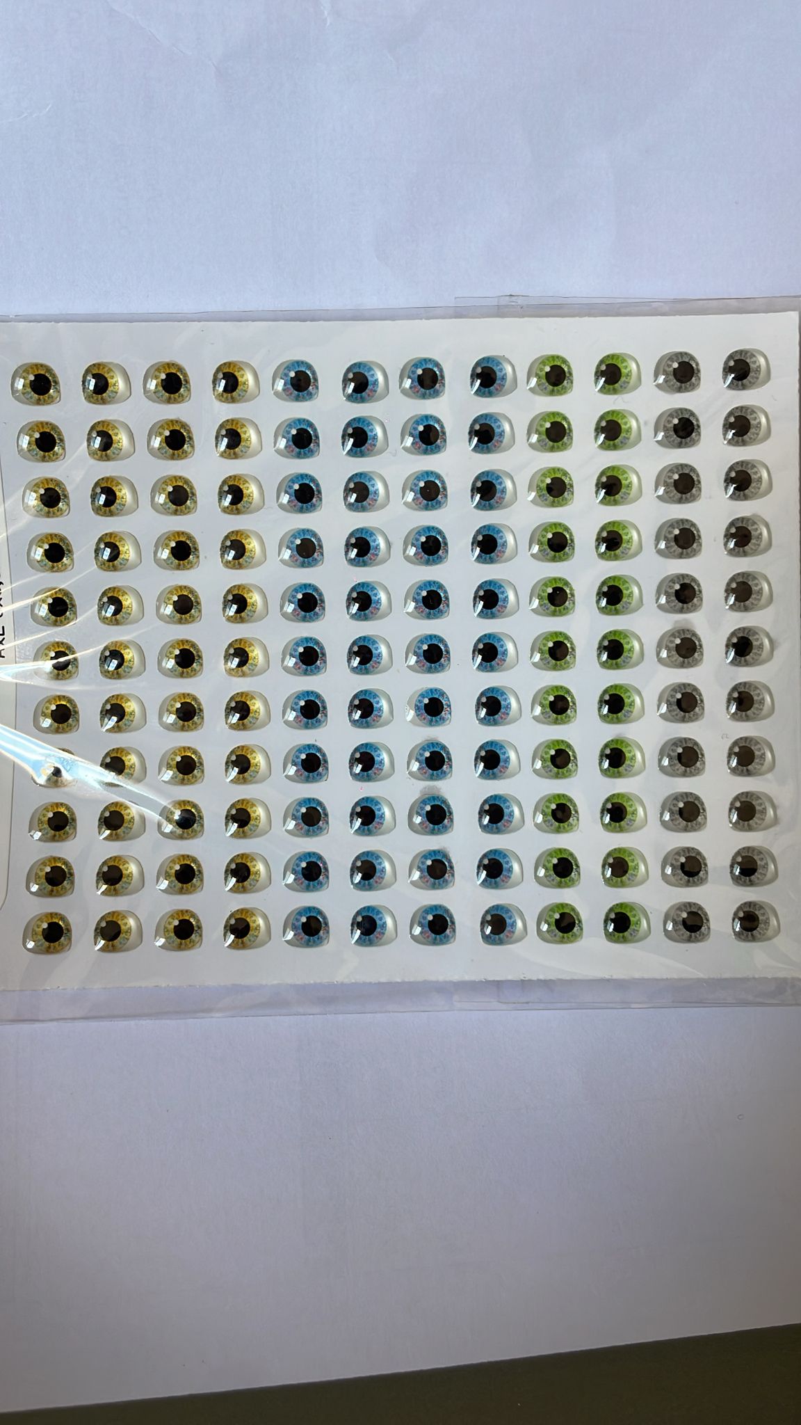 Ojitos resinados 709