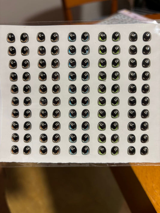 Ojitos resinados 711